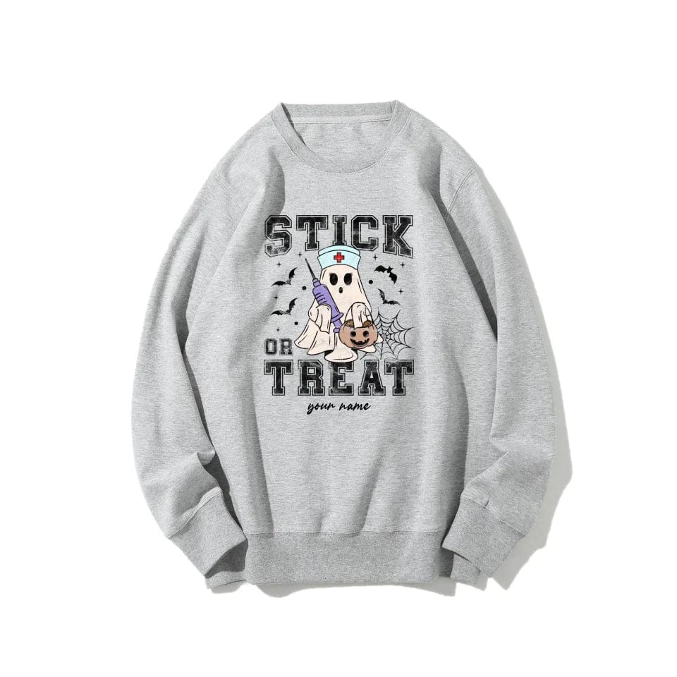 Vintage Halloween Stick Or Treat Ghost Nurse Halloween T-shirt | Sweatshirt | Hoodie - Halloween Nurse Apparel